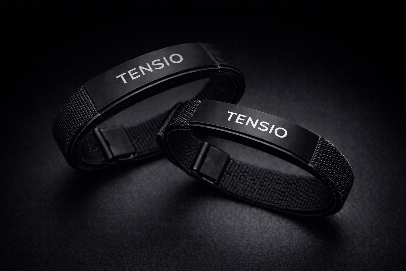 Tensio dual wrist bands for weightlifting